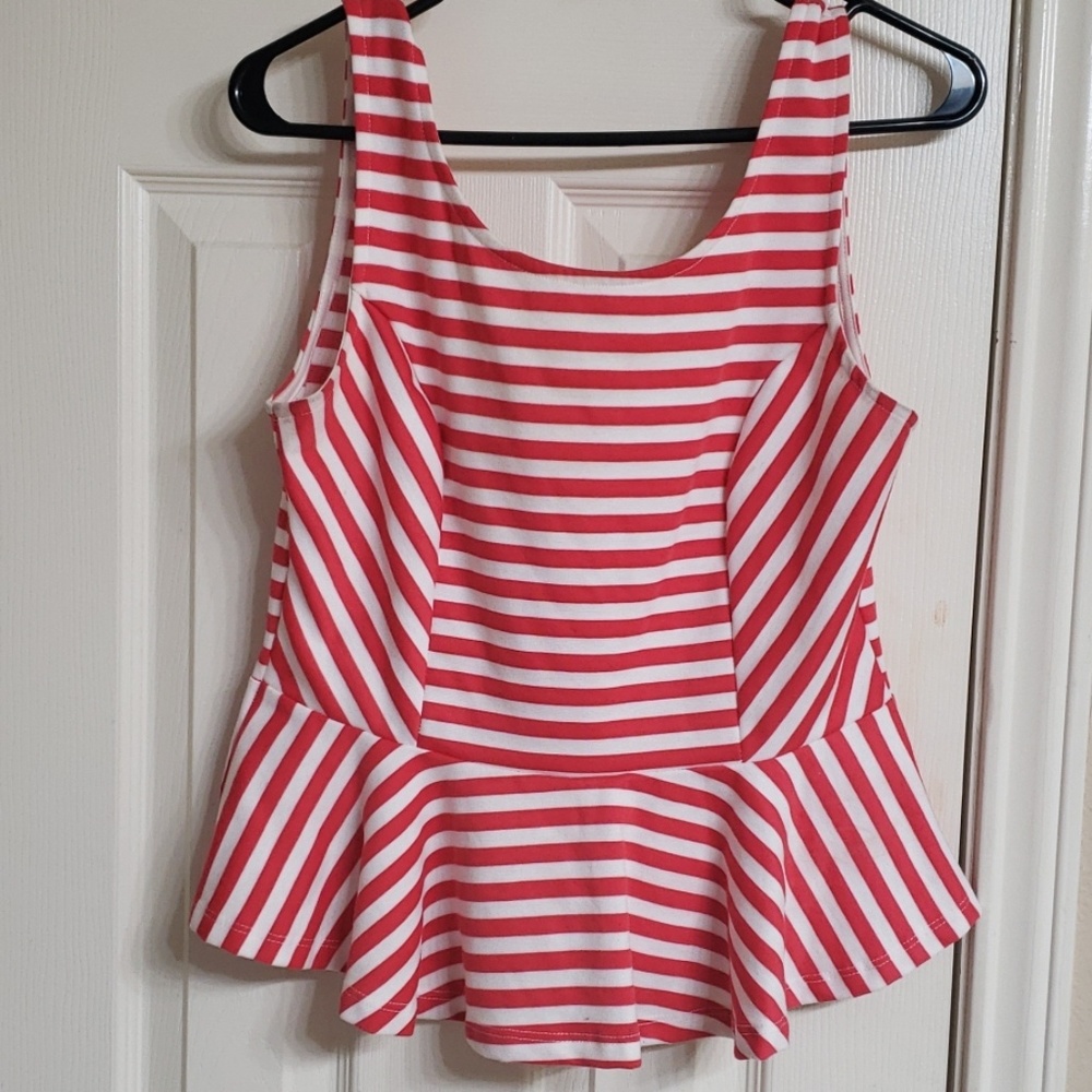 Orange and white striped peplum top